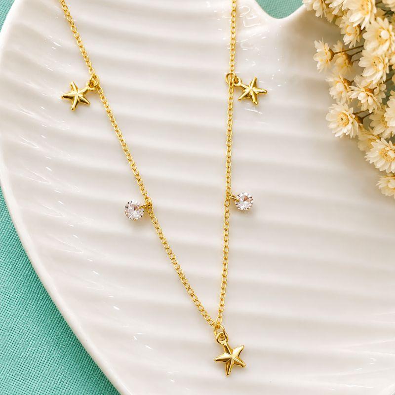 CHOKER CORRENTE CADEADO COM ESTRELAS E TIFFANY BANHADA OURO