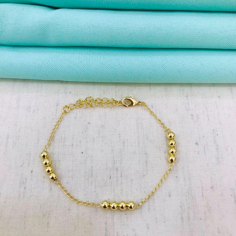 PULSEIRA ESFERAS MÉDIAS BANHADA OURO